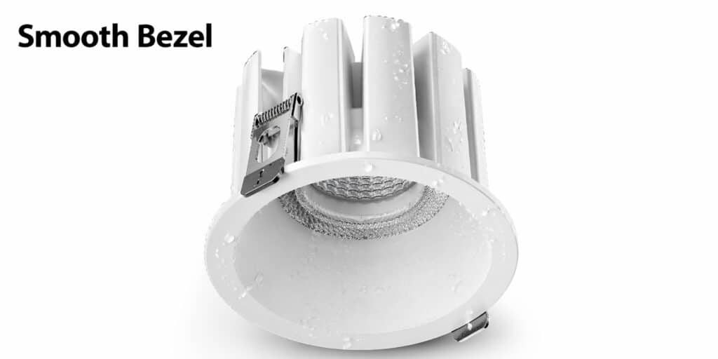 White recessed LED ceiling light with a smooth bezel and visible cooling fins
